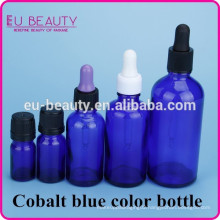 Blue glass bottle for essential oil